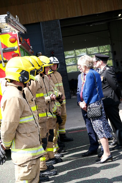 Firefighters from Saughall Massie's White Watch are introduced to Wirral's mayor and mayoress by Chief Fire Officer Phil Garrigan
