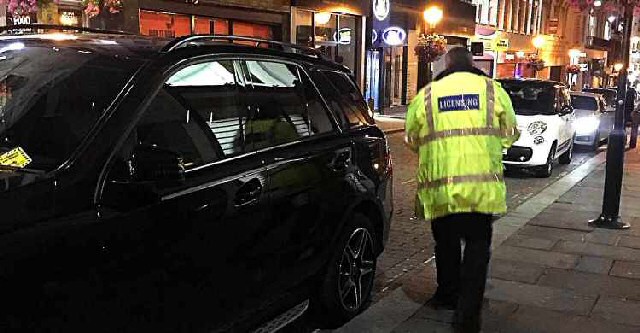 On Patrol: City Council Licensing Officers checking vehicles in the City Centre.