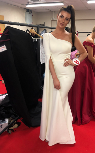 Miss Liverpool City Region 2019 Finley back stage at Miss England with the No. 20. number on her wrist.