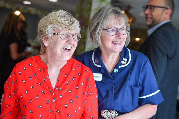 Resident Jean Timmins along with registered nurse Sara Beaumont.