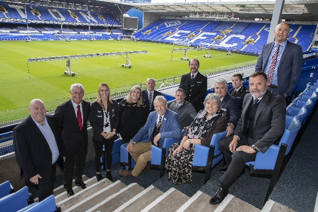 Image 2 (L-R) Mayor Joe Anderson, LFC legend Ian Rush, LFC Foundation's Gemma Smith, Everton in the Community's Director of Youth Engagement Sue Gregory and Director of Marketing and Communications Richard Kenyon, Prof John Ashton, LFC legend Jamie Carragher, Merseyside Police's Supt Mark Wiggins, PCC Jane Kennedy, Everton FC ambassador Ian Snodin, Merseyside Police's ACC Rob Carden, Everton FC ambassador Graeme Sharp, and Dr Matthew Philpott, Executive Director of the European Healthy Stadia Network.