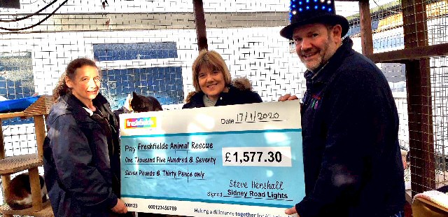 Photo caption:- Picture shows Helen Stanbury, Freshfields Director with Steve Henshall and his wife Jan, along with the cheque 